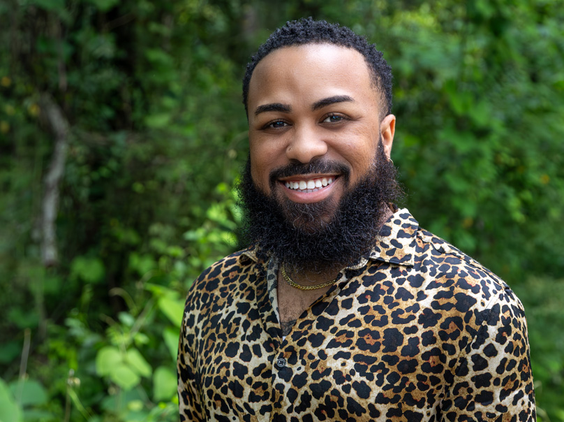 Headshot of Brandon Anderson in an outdoor setting